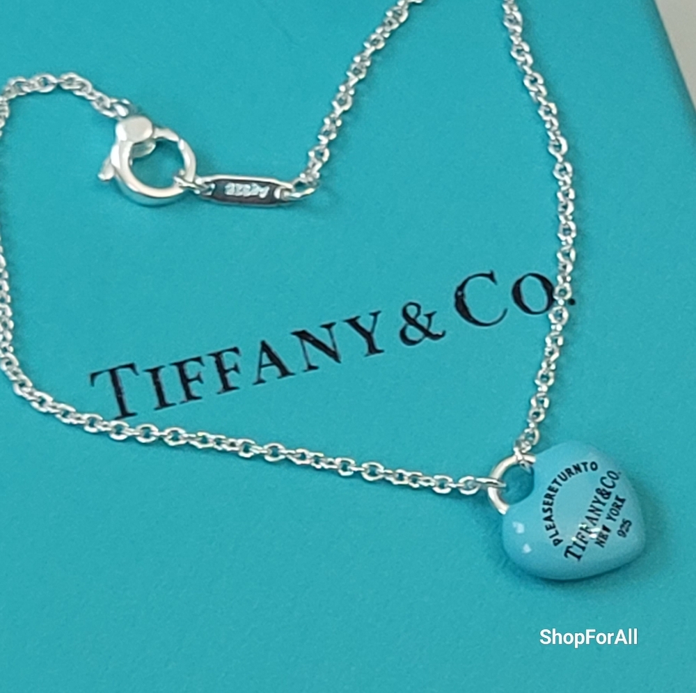 Tiffany & Co. Silver Bracelet with Blue Heart Charm